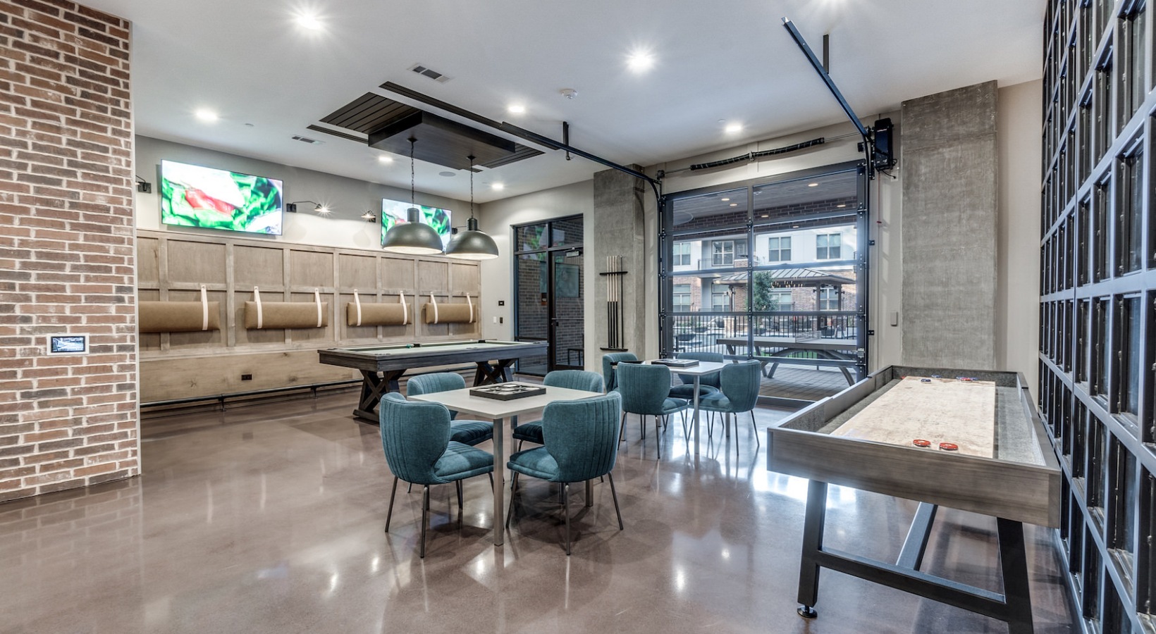 a large open room with a pool table, bar and television at The Cedar at  Branch